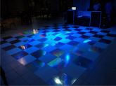 Pista de dança com adesivo holográfico em lona.Medindo 4x4mt